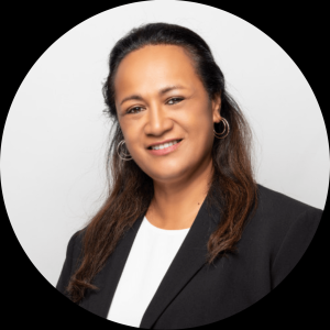 Headshot of a woman in a blazer.